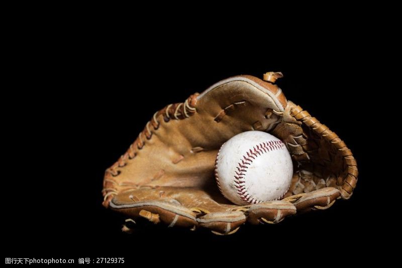 棒球运动员皮袋里的棒球图片