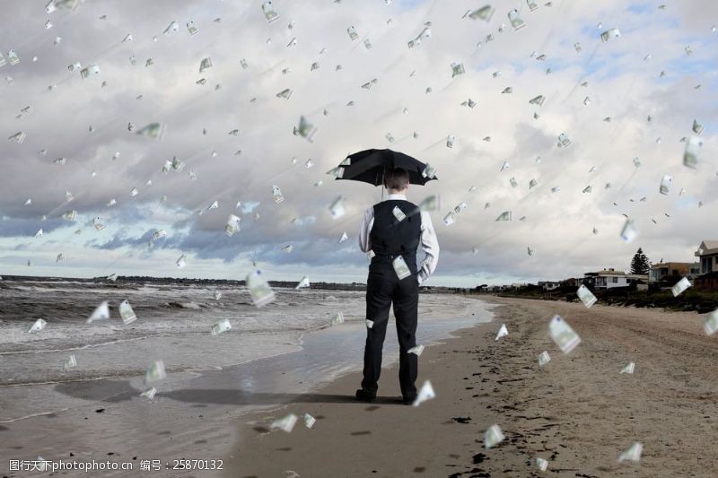 打伞人海边打伞的男人和钞票雨图片