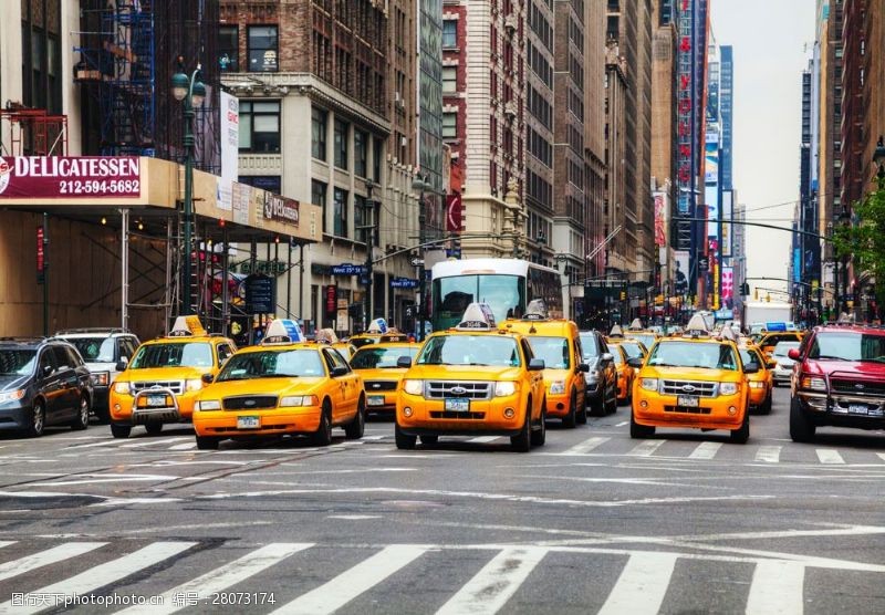 车辆马路上的黄色出租车图片
