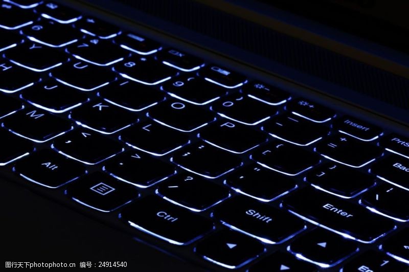 笔记本电脑发荧光的数码健盘图片